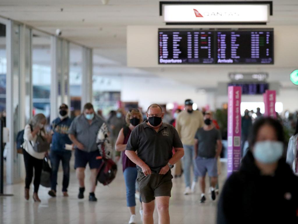 Fully vaccinated South Australians returning from overseas may participate in a new home quarantine pilot program. Picture: NCA NewsWire / Kelly Barnes