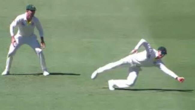 Steve Smith takes a stunning catch to remove Dawid Malan.
