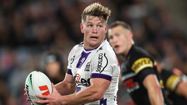 Harry Grant of the Storm looks to pass the ball during the NRL Preliminary Final match between the Penrith Panthers and Melbourne Storm at Accor Stadium on September 22, 2023 in Sydney, Australia. (Photo by Brendon Thorne/Getty Images)