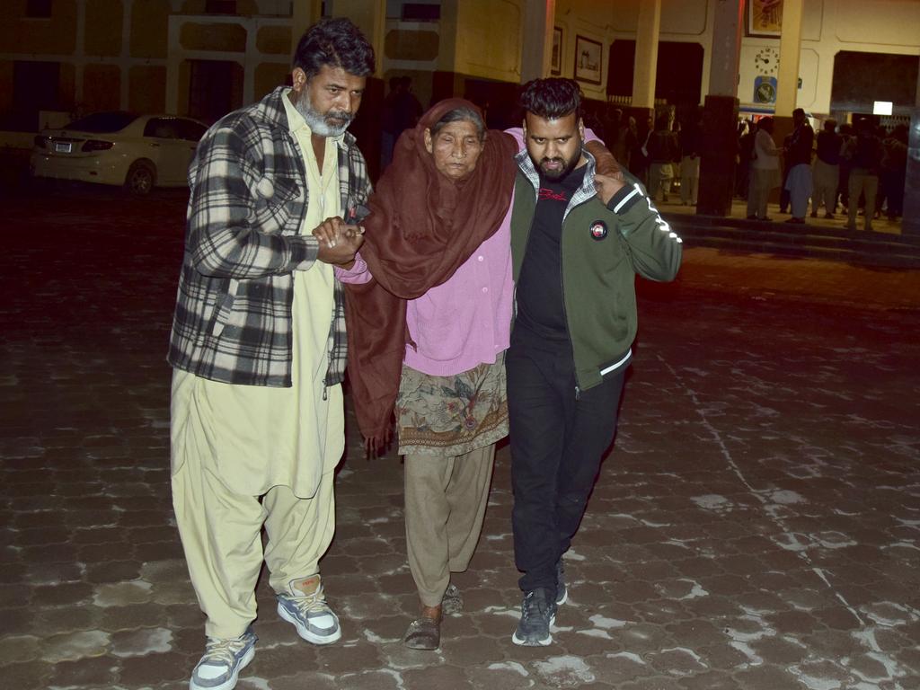 Rescued passengers from a train attacked by insurgents arrive at a railway station in Quetta, Pakistan. Picture: AP