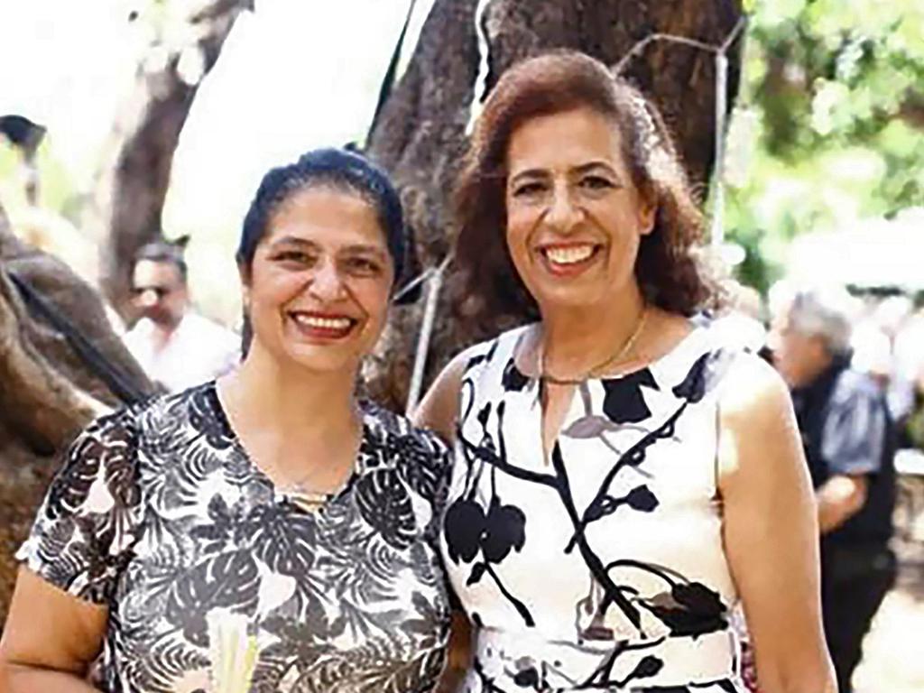 The bodies of Australian scientist Lily Pereg (left) and her sister Pyrhia Sarusi were found buried next door to the squalid house of Pyrhia's son, Gil.