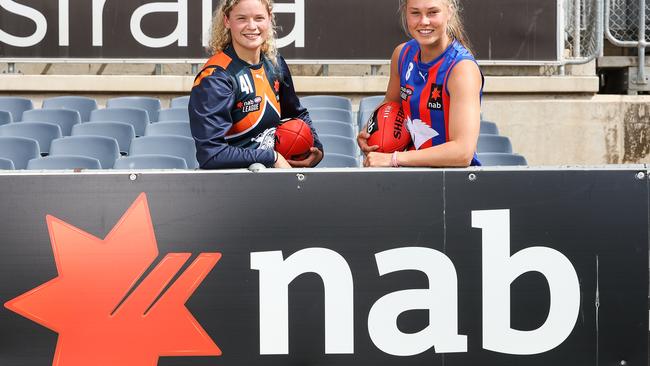 Georgie Prespakis of Calder Cannons and Charlie Rowbottom of Oakleigh Chargers pose for a photo during the 2021 NAB League Girls Season Media Launch at Ikon Park on February 2, 2021 in Melbourne, Australia. (Photo by Martin Keep/AFL Photos via Getty Images)