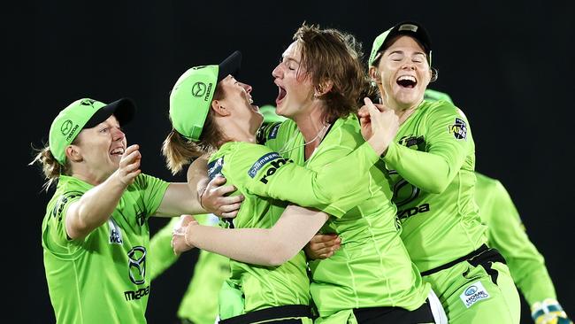 The Thunder celebrate Sammy-Jo Johnson match-winning wicket in the WBBL semi-final.