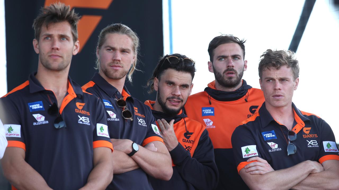 Zac Williams, middle, with GWS teammates after last year’s grand final loss. Picture: Phil Hillyard