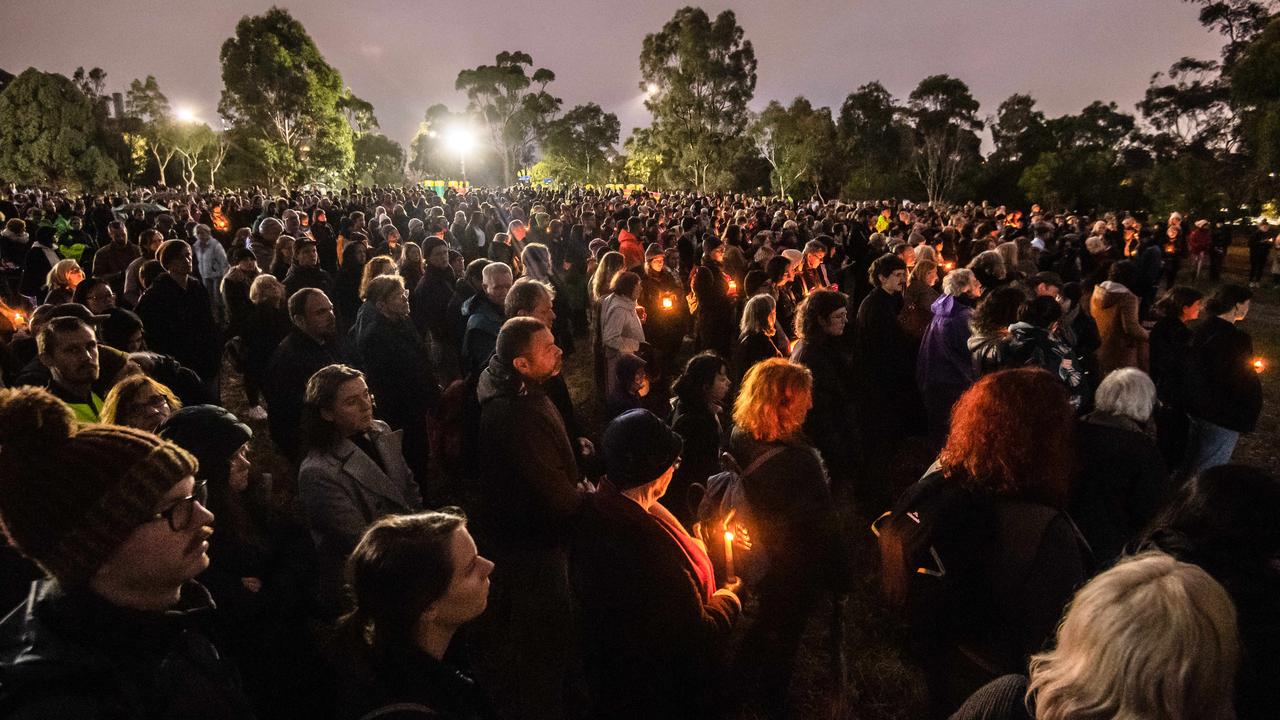 Crowds turned out in the rain and cold to honour Courtney. Picture: Jason Edwards