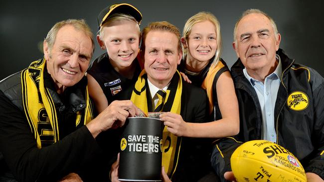 Graham Cornes, fan Joe Chigwidden (11), Nick Chigwidden, fan Summer Ryan (12) and Peter Carey launch the club's 'Save the Tigers' fund in 2016. Picture: Bianca De Marchi