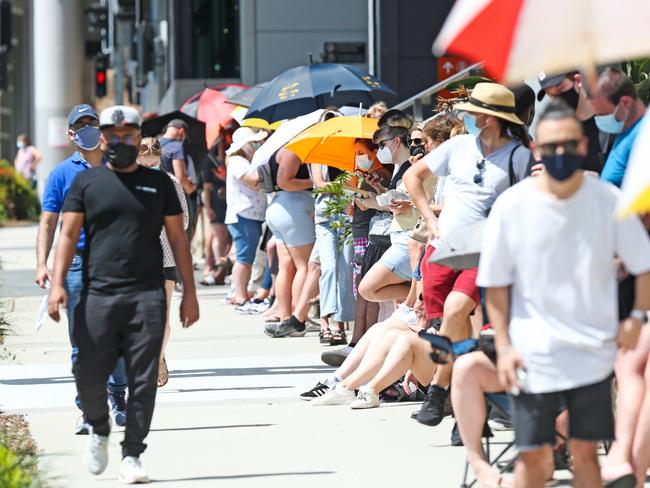 People line up to get COVID 19 tests out the front of the Royal Brisbane and Women's Hospital. Picture: Zak Simmonds