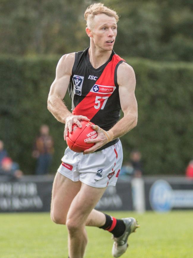 Nick Hind in action for Essendon in the VFL last year.