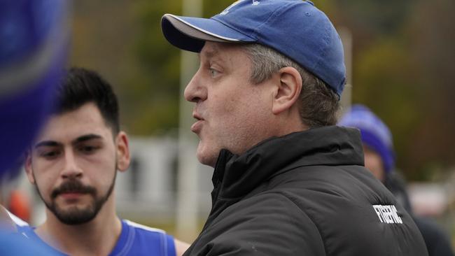 Ferntree Gully coach Brent Kiker addressing the players on Saturday. Picture: Valeriu Campan