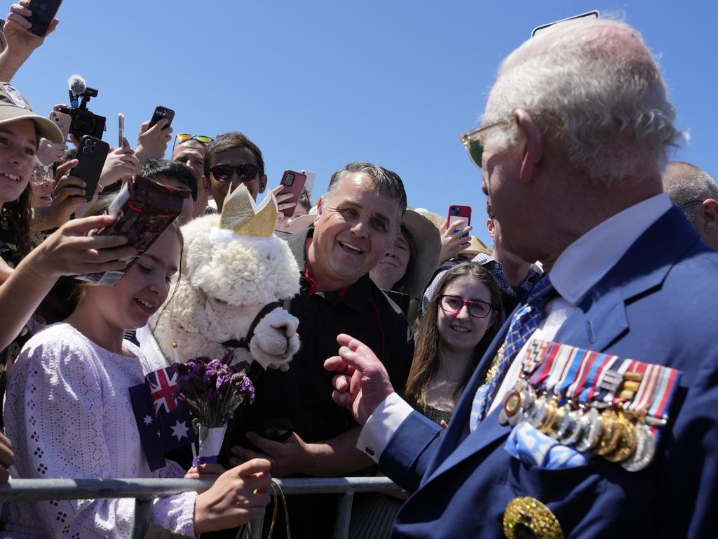 King Charles speaks with an owner of an alpaca before leaving the Australian War Memorial on October 21. Picture: Getty Images