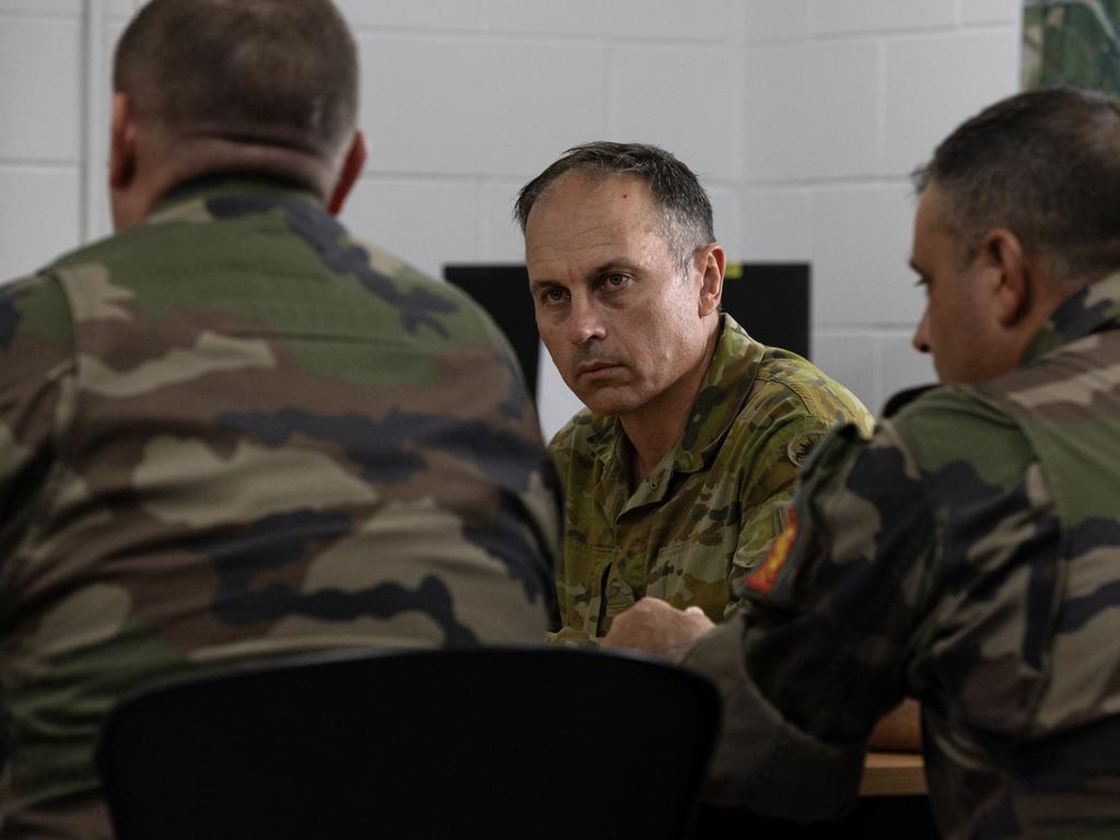 Commander Australian Combat Training Centre Colonel Ben McLennan discussing learning outcomes with his French Armed Forces counterparts Colonel Tony Garnier and Commandant Antoine Derulliere, during Exercise Talisman Sabre 2023. PHOTO: CPL Julia Whitwell