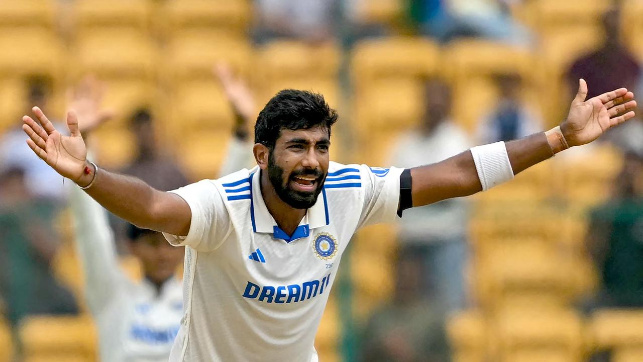 India's Jasprit Bumrah successfully appeals for leg before wicket (LBW) against New Zealand's Devon Conway during the fifth and final day of the first Test cricket match between India and New Zealand at the M. Chinnaswamy Stadium in Bengaluru on October 20, 2024. (Photo by IDREES MOHAMMED / AFP) / -- IMAGE RESTRICTED TO EDITORIAL USE - STRICTLY NO COMMERCIAL USE --