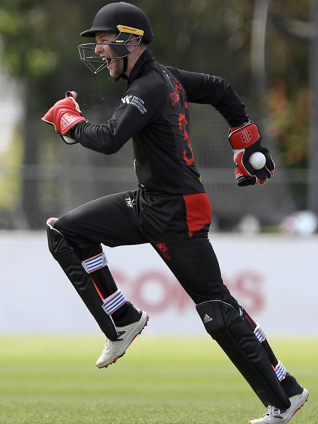 Nathan Shoesmith celebrates a wicket for Essendon. Picture: Andy Brownbill