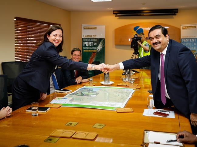 Adani Group chairman Gautam Adani meets with Queensland premier Annastacia Palaszczuk at the Port of Townsville, Tuesday, Dec. 6, 2016. The Queensland government has been given an "iron clad" guarantee from Indian mining giant Adani that it will not use 457 visas at its Carmichael mine and will prioritise local workers. (AAP Image/ Cameron Laird) NO ARCHIVING