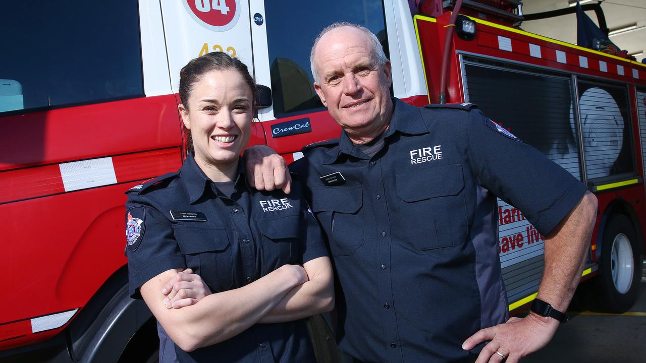 Belmont firefighter Graham Lane is retiring after 35 years on the job. Pictured with his daughter Becky Linke, who is also a firefighter. Picture: Alan Barber