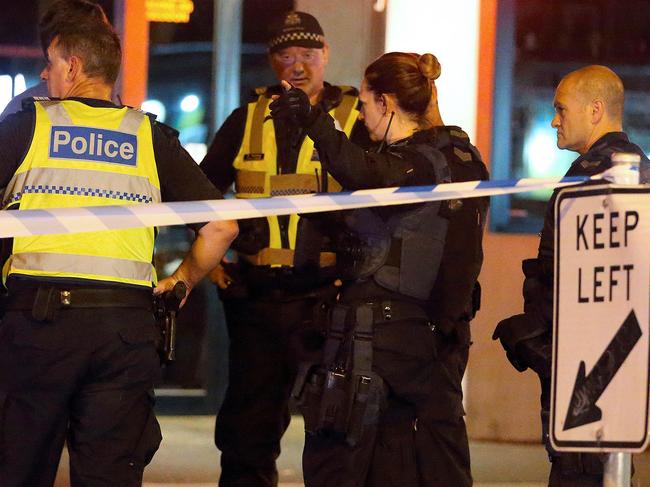 SEDDON, VICTORIA - NOVEMBER 18: Police discuss events of the stabbing. Cnr Victoria Street & Charles St on November 18, 2017 in Seddon, Victoria. (Photo by Patrick Herve) Fees Exist.