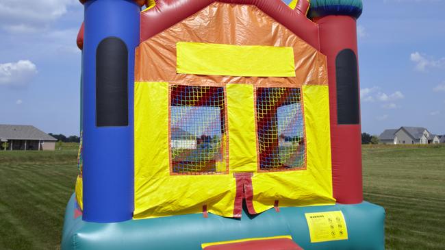 Two arsonists hired by a bouncy castle business owner to get rid of his competition have had years taken off their prison time.