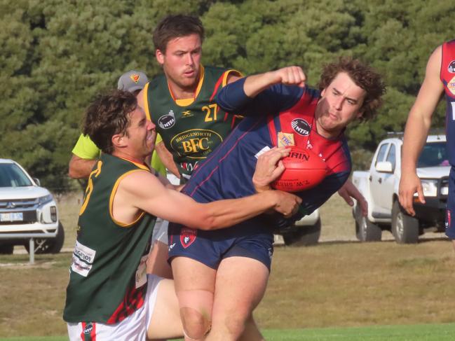 Lilydale's Beau Malkin is tackled. Picture: Jon Tuxworth