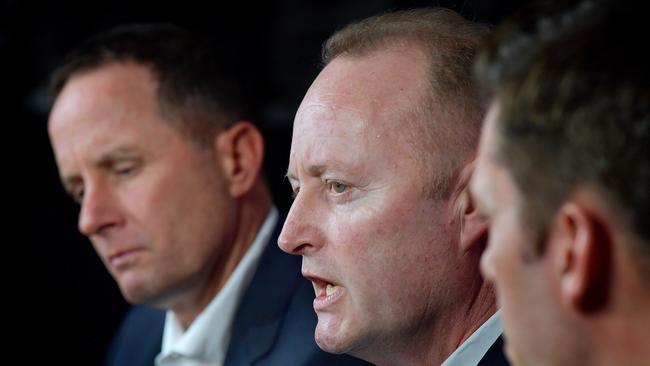 Don Pyke, left, Crows chairman Rob Chapman and Crows CEO Andrew Fagan at a media conference to announce Pyke’s departure on Thursday. Picture: Getty Images