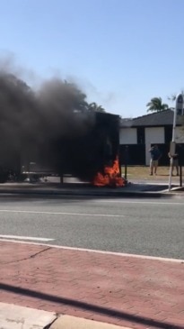 A bus stop suddenly burst into flames on the Gold Coast