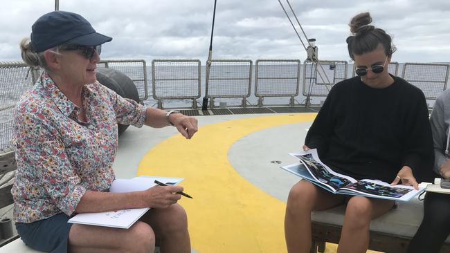 Author Alison Lester and Greenpeace campaigner Charlie Cox discuss ideas for a Rainbow Warrior or Bight-themed children’s book. Picture: Ben Brennan