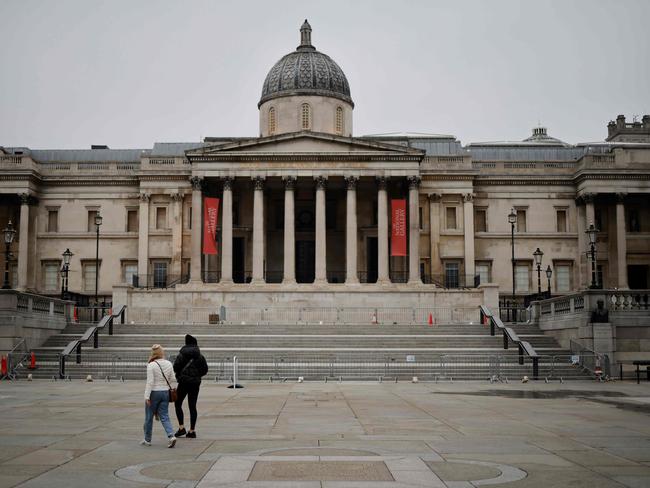 People cross a near-deserted Trafalgar Square in central London on January 8 as England entered a third lockdown. Picture: AFP