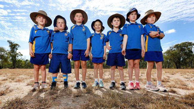 Valkyrie State School students Koko Black, year 2, Toby Black, year 1, Jaxon Parmenter, year 3, Brooke Hanrahan, year 2, Ari Michelmore, year 1, Ivy Michelmore, year 3, and Lacey Hanrahan, year 4, are unable to use the oval due to a lack of water. Pics Tara Croser.