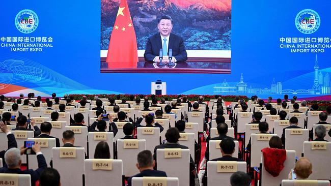 President Xi Jinping delivering a speech via video. Picture: STR/AFP