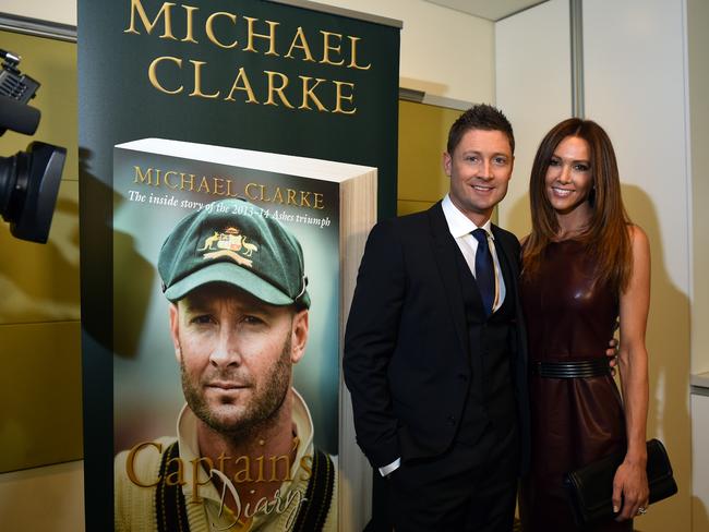 Australian test cricket captain Michael Clarke and wife Kyly Clarke pose for a photograph at the launch of his book 'Captains Diary'. Picture: AAP