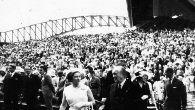 The Queen walks with then NSW premier Robert Askin in front of a large crowd to open the Sydney Opera House on October 20, 1973. Picture: News Ltd