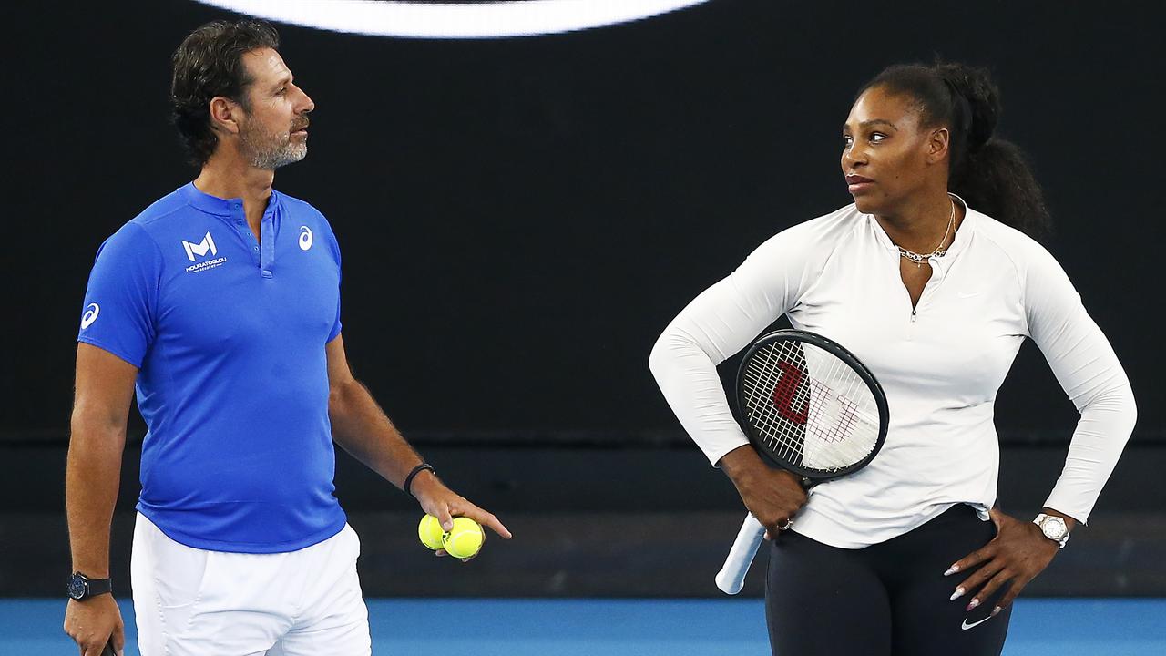 MELBOURNE, AUSTRALIA - JANUARY 17: Serena Williams of United States (R) speaks with coach Patrick Mouratoglou during practice ahead of the 2020 Australian Open at Melbourne Park on January 17, 2020 in Melbourne, Australia. (Photo by Daniel Pockett/Getty Images)