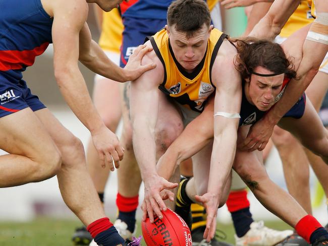 Dominic Brew (pictured playing for Werribee Tigers) competes for possession with Coburg’s Marcus Lenten during a Round 18 VFL clash at Piranha Park on August 4, 2018. Brew arrived in Darwin last night and is a big signing at Nightcliff for the upcoming 2020-21 NTFL season. Picture: DARRIAN TRAYNOR/GETTY IMAGES