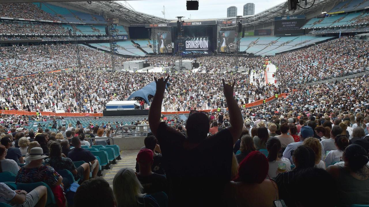 Plenty of fans were keen to see Grinspoon ... but perhaps none more so than this gentleman. Picture: AFP