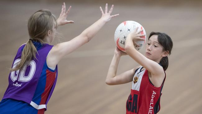 School Sport SA Sapsasa Netball Carnival action as Adelaide North East takes on Playford at Netball SA Stadium. Picture: Simon Cross