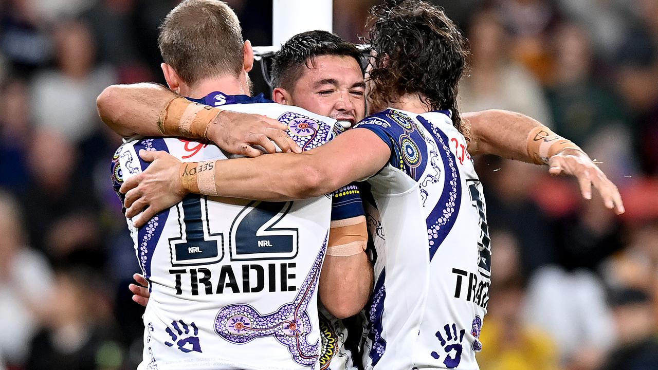 Brandon Smith celebrates scoring a try. Photo by Bradley Kanaris/Getty Images.