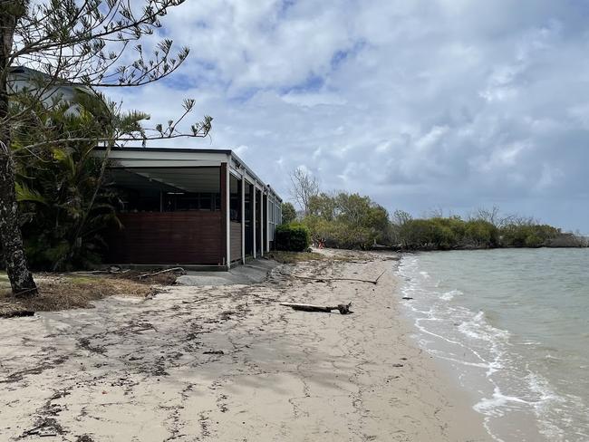 Debris can be seen strewn across the beach outside the Caloundra Power Boat Club. Photo: Andrew Hedgman