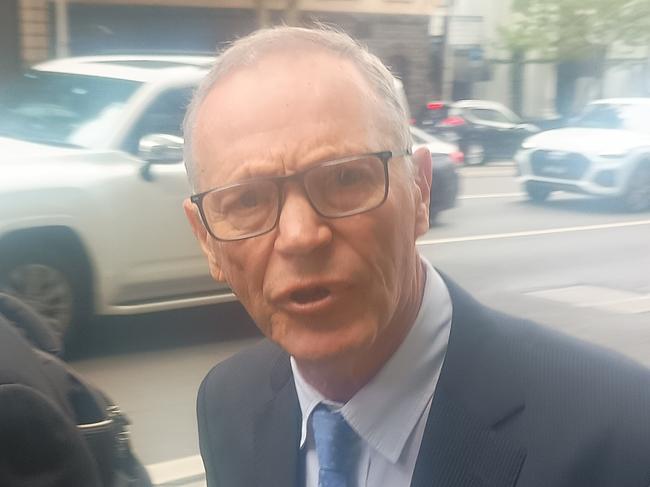 Former professor of neurosurgery Andrew Kaye, 74, leaves the Victorian Civil and Administrative Tribunal, where he has been accused of making an inappropriate sexual advance against a young female doctor.