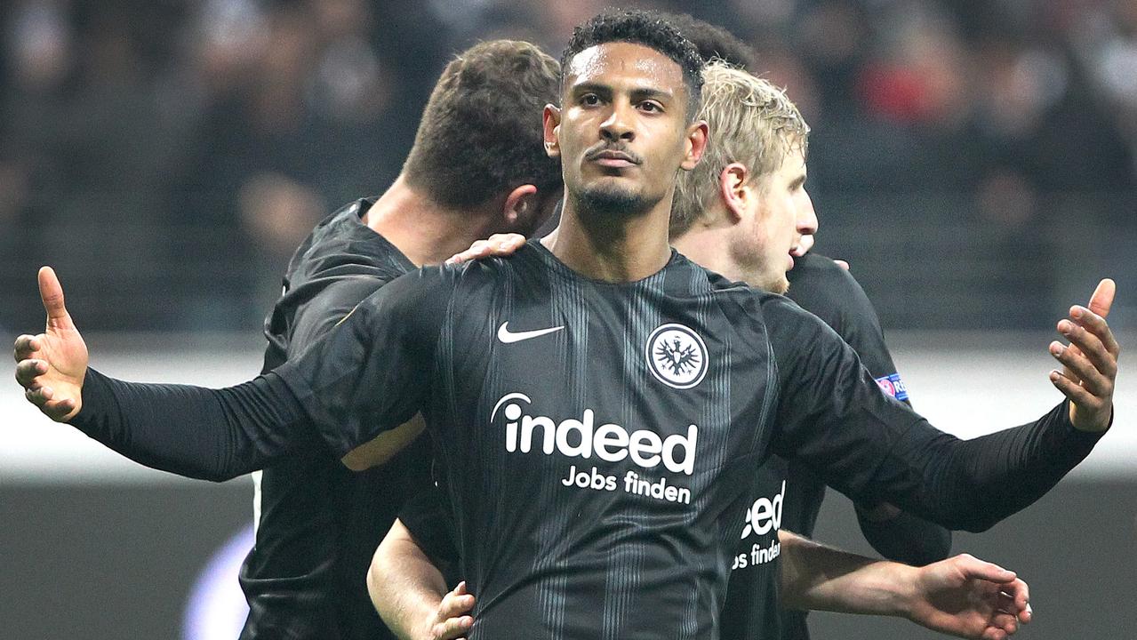 Sebastien Haller celebrates after scoring during a Europa League game.