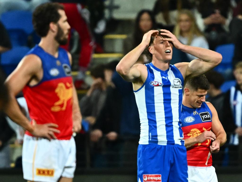 Brisbane’s Darcy Fort (left) and North Melbourne’s Nick Larkey reflect on Sunday’s draw in Hobart. Picture: Steve Bell/Getty Images