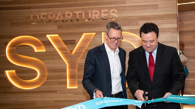 Sydney Airport chief Geoff Culbert (left) with Jobs Minister Stuart Ayres in happier times just over a year ago when the facility unveiled a new departures area at the T1 international terminal. Picture: AAP/Monique Harmer