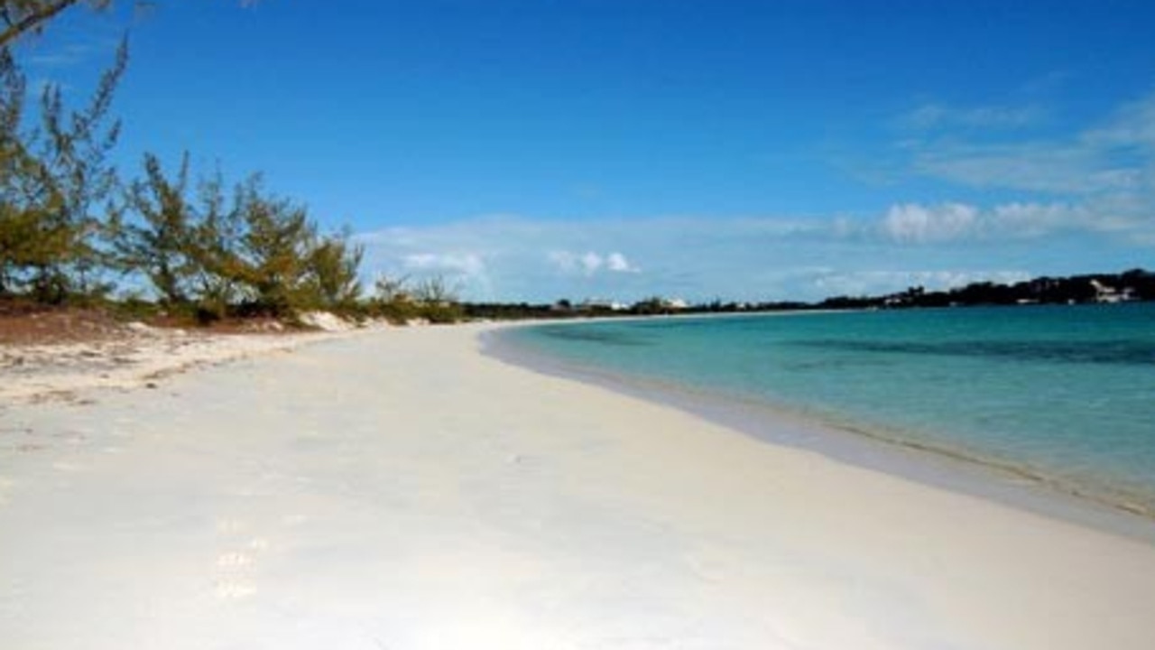 Providenciales beach – the woman managed to hobble to safety despite a bite to her upper leg. Picture: Supplied