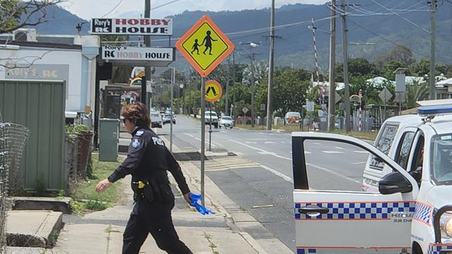 A police officer heads towards FoodWorks on Main Street, Park Avenue, on October 2, 2022.