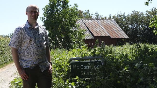 Rudkoping archivist Jeppe John Horsholm outside the machinery barn on Rudkoping, Langeland where Australian pilot Alan McCormack hid. Picture: Jacquelin Magnay