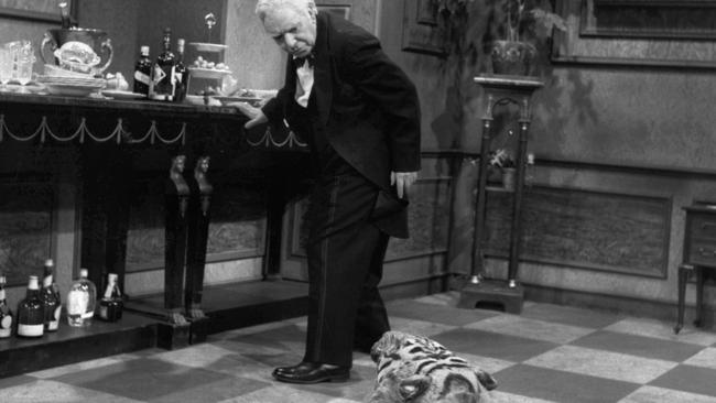 Freddie Finton trips over the tiger-skin rug in the Dinner For One sketch. Picture: SBS