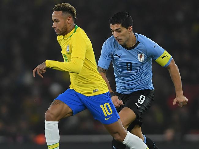 Brazil’s Neymar (left) and Uruguay’s Luis Suarez (right) are among the calibre of opponents the Socceroos could face in 2020. Picture: Getty Images