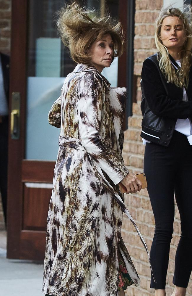 Anna Wintour experiences extreme wind hair while visiting an office in Manhattan.