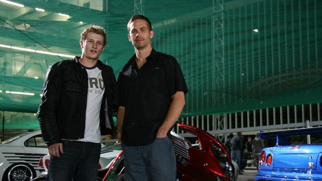 Australian BMX star and aspiring Rhys Kember, 32, pictured with actor Paul Walker (right) on the set of Fast &amp; Furious 4.