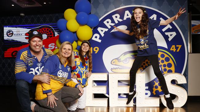 Paul and Lesley Kelly with their daughters Lara and Ella get into the spirit at Parramatta Leagues Club. Picture: Richard Dobson