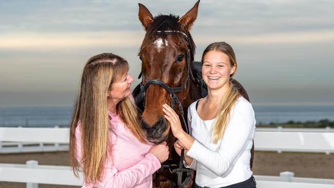 South East Equestrian Club’s Donna Wright and Baylei McGuigan celebrating the return of horses to Malabar Headland. Picture: Monique Harmer