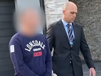 A male nurse being arrested at Prestons on Friday, April 1 2022 for a series of alleged sexual offences on patients and a colleague at Sydney hospitals. Picture: NSW Police